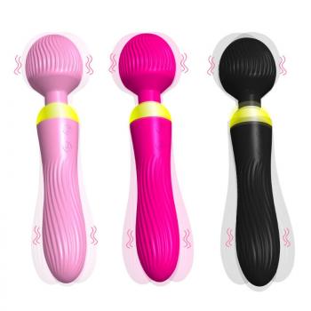 Magnetic dual vibrator massager